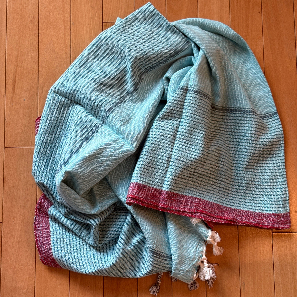 Light blue Turkish towel with teal stripes