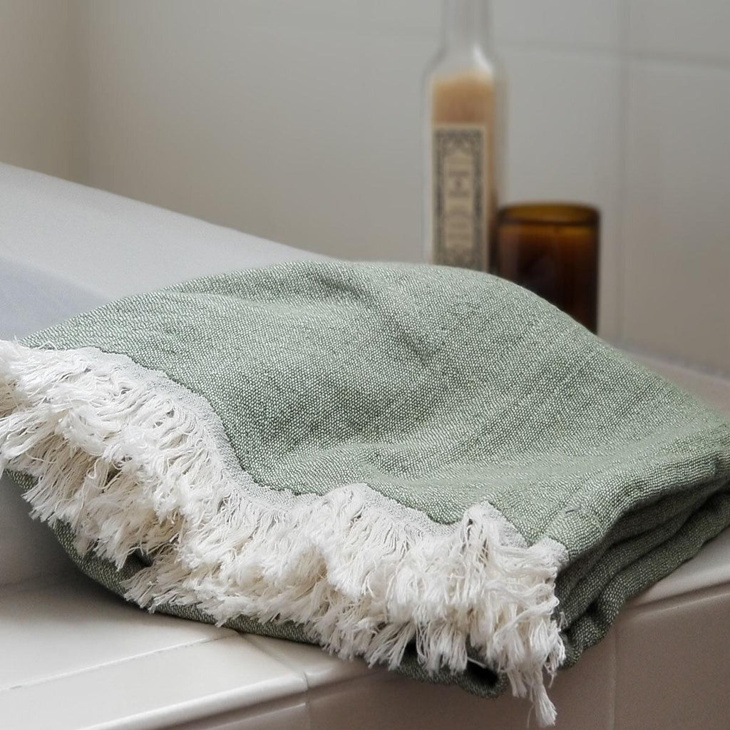 green muslin bath towel