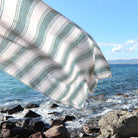 green and white turkish towel